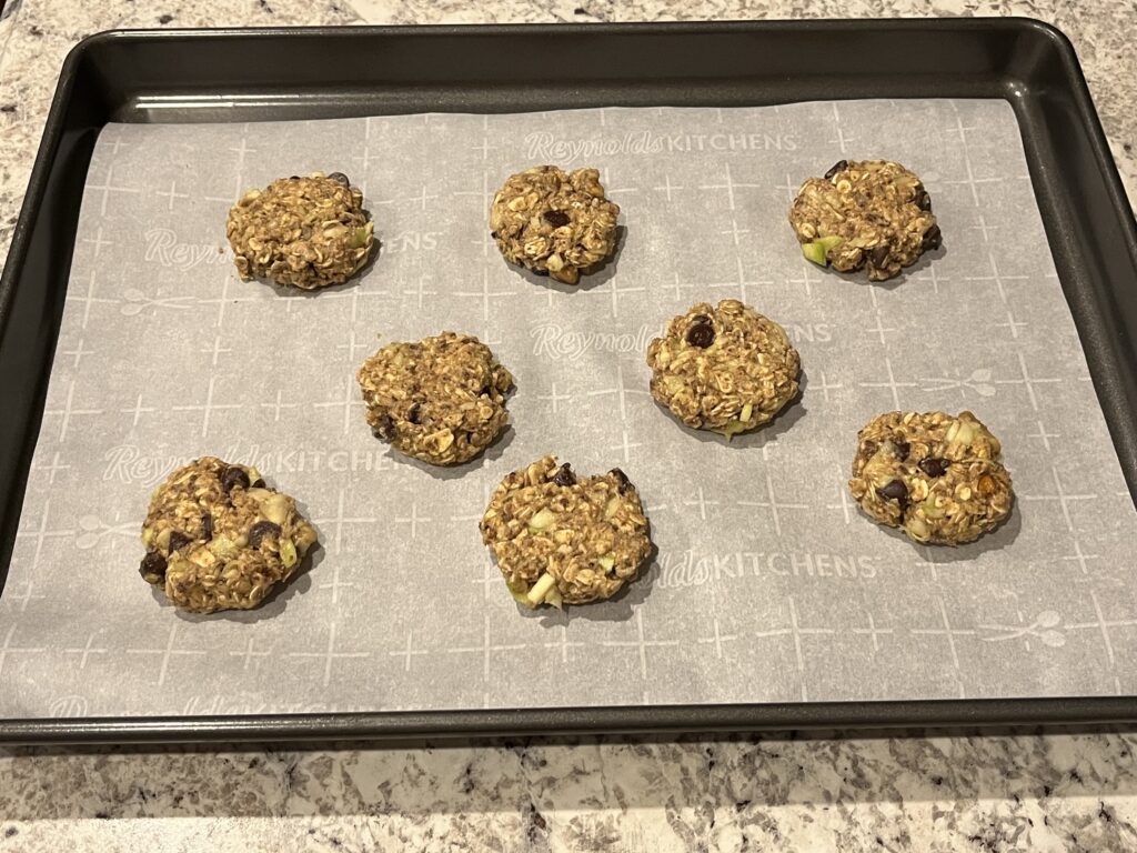 walnut zucchini cookies on baking sheet