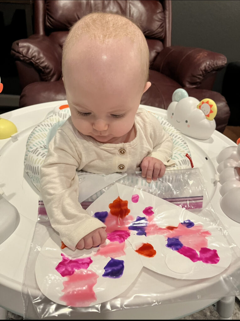 Lizzy painting Valentine's Day crafts